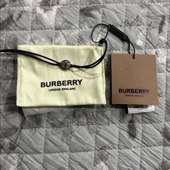 Burberry Other - Burberry Black Cord Bracelet with Silver Charm